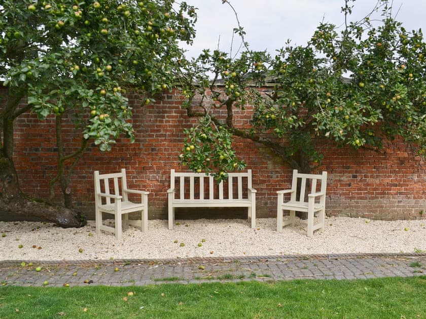 Sitting-out-area | Pampita Lodge - Tickton Hall Cottages, Beverley