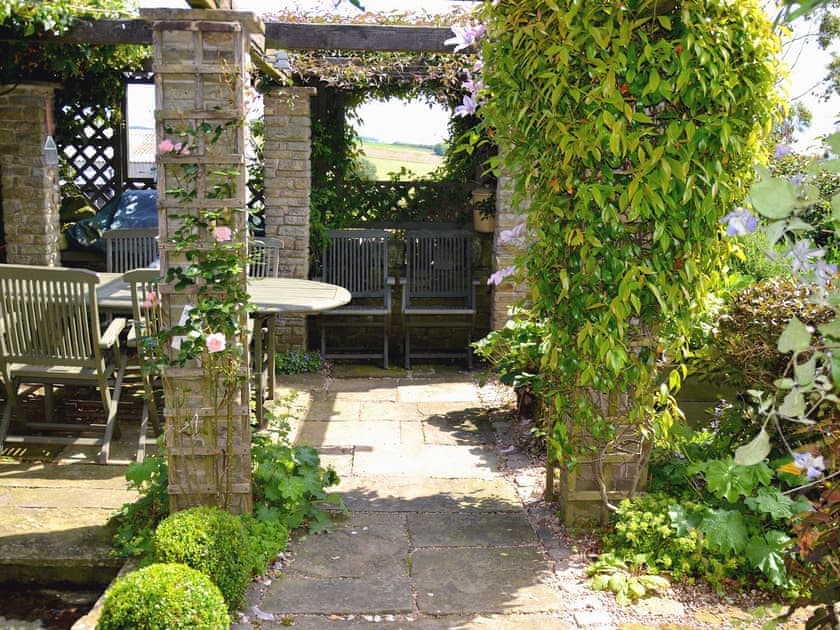 Fantastic barbeque area in shared gardens | The Barn at Woodland View, Barlow, near Chesterfield