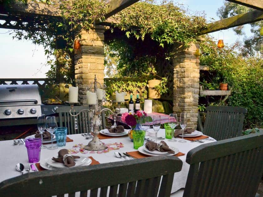 Fantastic barbeque area in shared gardens | The Barn at Woodland View, Barlow, near Chesterfield