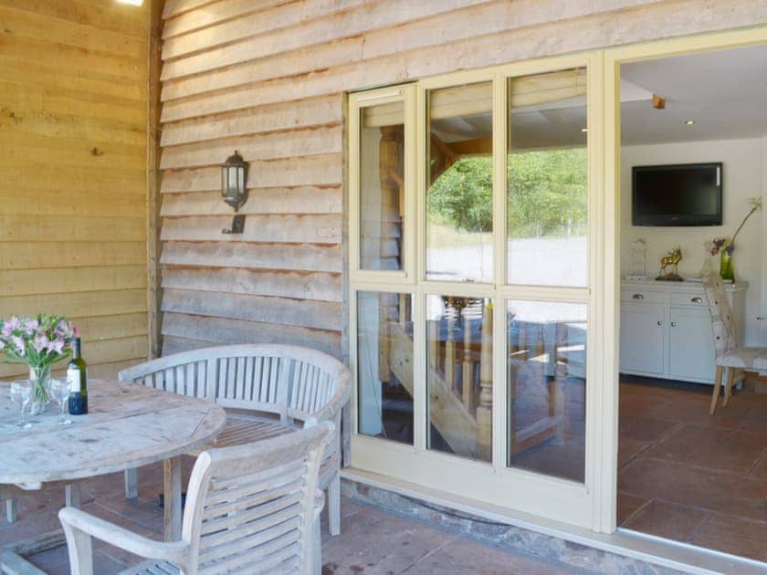 Shady outdoor eating area | Beer Farm, Waterrow, near Wiveliscombe