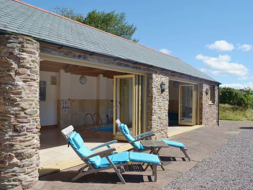 Relax in the sunshine after a quick dip in the pool | Beer Farm, Waterrow, near Wiveliscombe