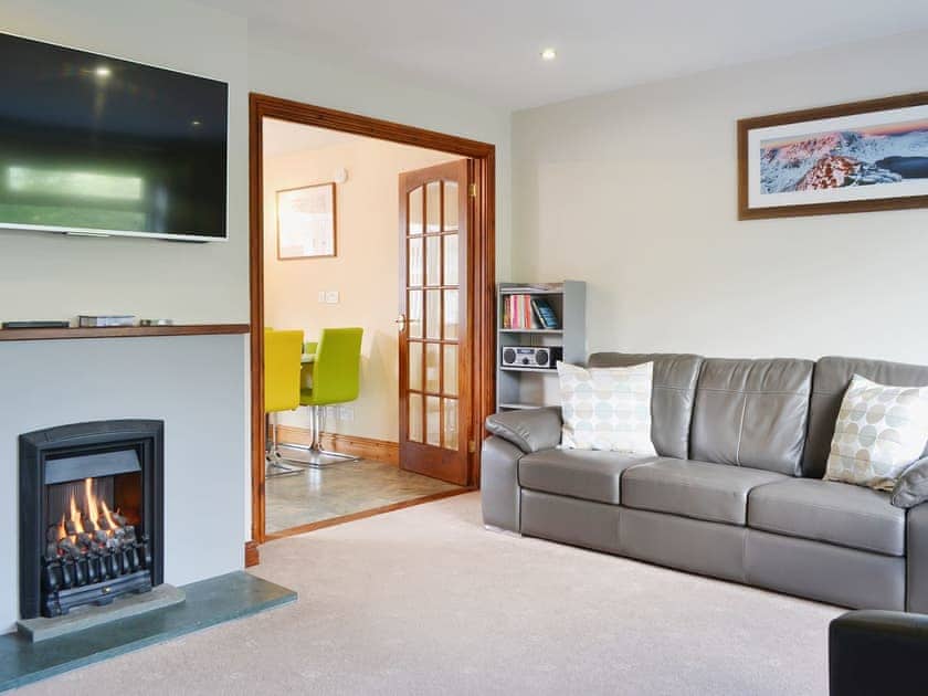 Stylish living room with gas fire | Briar Rigg, Keswick