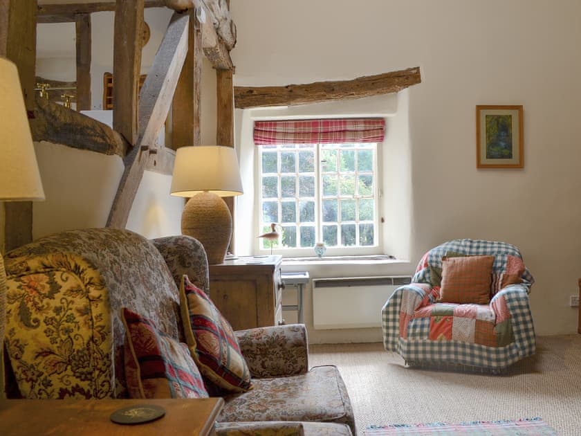 Cosy, rustic style living room | The Bothy, Clun, near Craven Arms