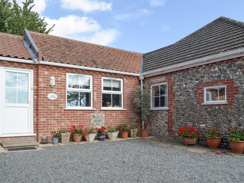 Dairy Farm Cottages Flint Cottage in West Caister, Norfolk Book