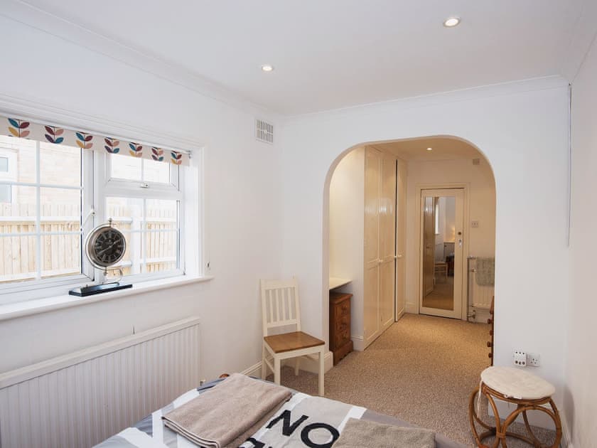 Double bedroom with stylish archway | The Swift, East Wittering