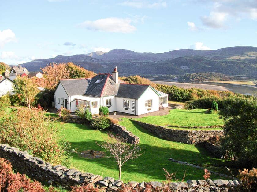 Located on the headland over Barmouth, the cottage has stunning views | Caefadog Fach, Barmouth