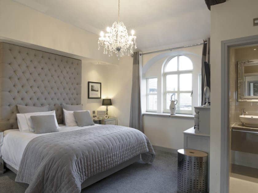 Impressive master bedroom with large en-suite shower room | Old Chapel House, Barnoldswick