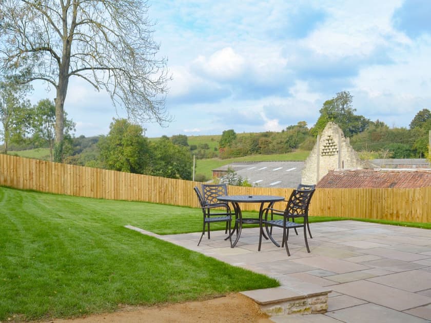 Garden and patio area | The Stables, Marksbury, near Bath
