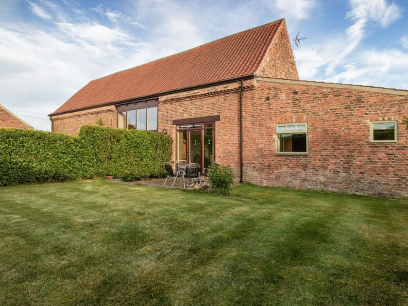 Lawned garden and patio | The Forge - Mackinder Farms, Brayton, Selby