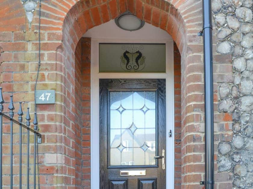 Delightful seahorse motif above the front door | The Seahorses - Seahorses, Sheringham