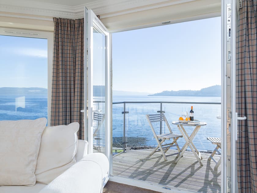 French doors open onto a sun-drenched balcony with fine views | The Penthouse, Strone, near Dunoon