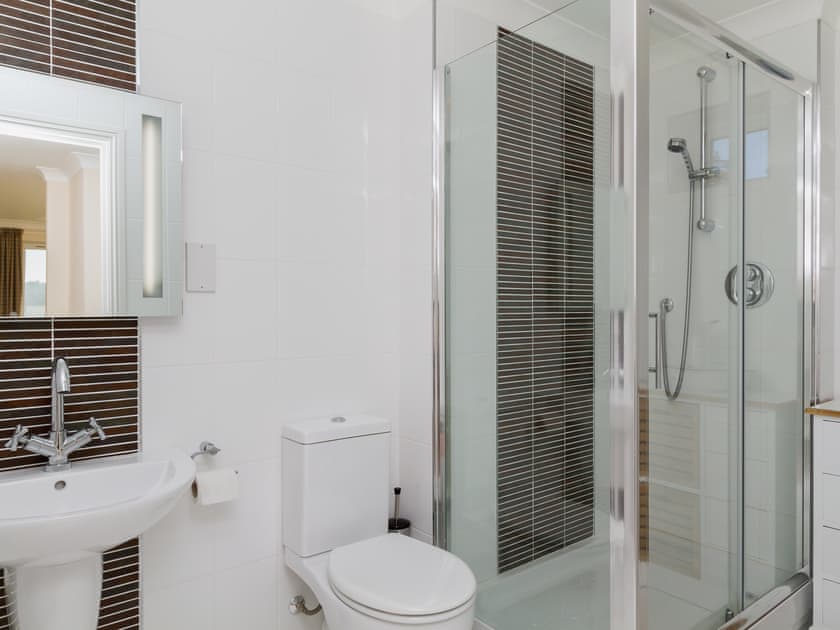Master bedroom complete with a stylish en suite shower room | The Penthouse, Strone, near Dunoon