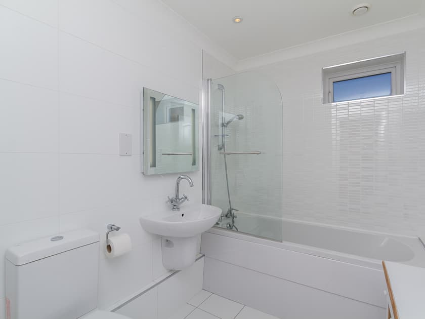 Family bathroom with shower over bath | The Penthouse, Strone, near Dunoon
