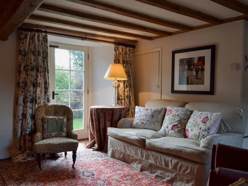 Cosy living room with open fire | Mill House - Rievaulx Cottages, Rievaulx, near Helmsley