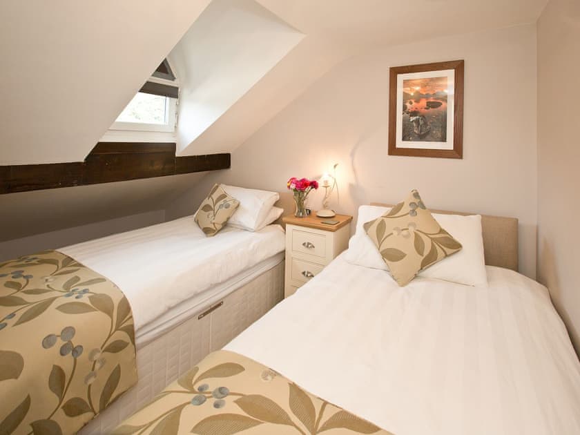 Quirky twin bedded room with sloping ceilings | 22 Rose Terrace, Keswick