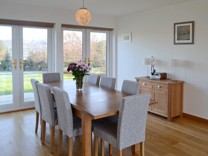 Dining area with French doors leading to garden | Carron House, Slumbay, near Lochcarron