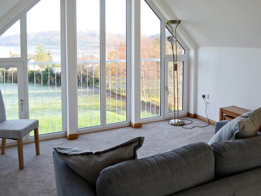 Living area with large picture windows | Carron House, Slumbay, near Lochcarron
