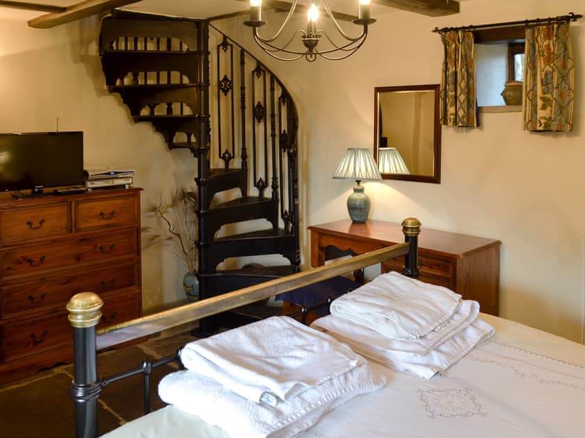 Comfy double bedroom with spiral staircase | Mushroom Cottage - Mullions and Mushroom Cottage, Castleton