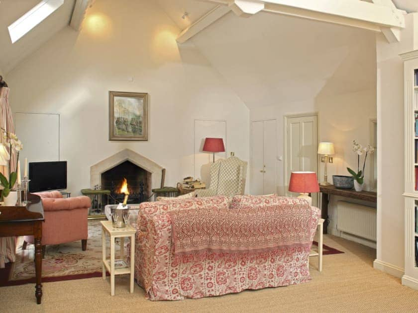 Cosy living area in open-plan living and dining room | Cope - Bruern Holiday Cottages, Bruern, near Chipping Norton