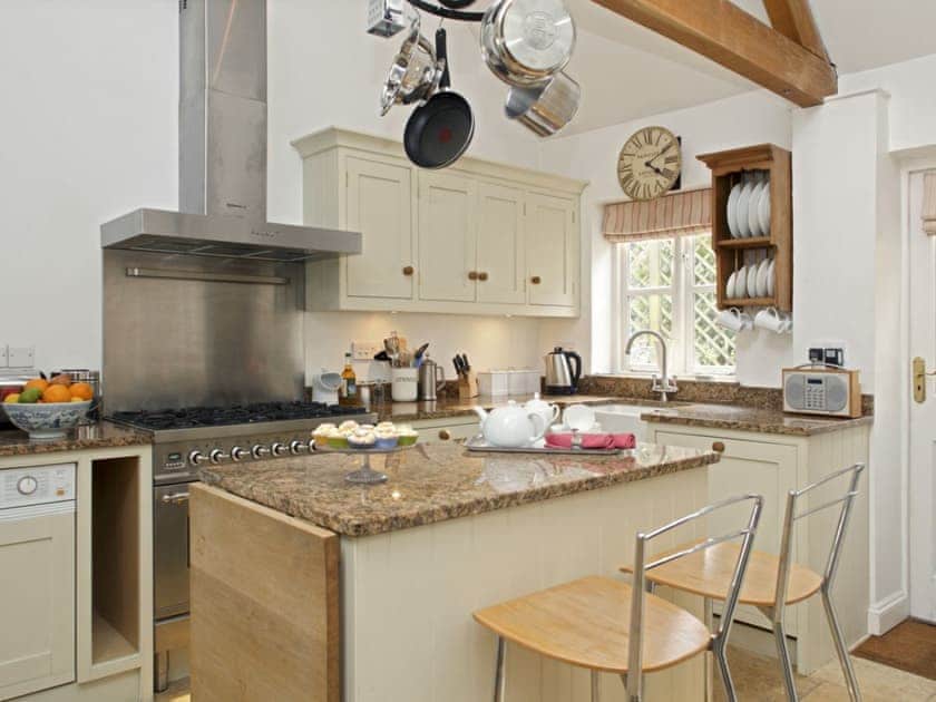 High quality fitted kitchen with ‘island’ breakfast bar | Cope - Bruern Holiday Cottages, Bruern, near Chipping Norton