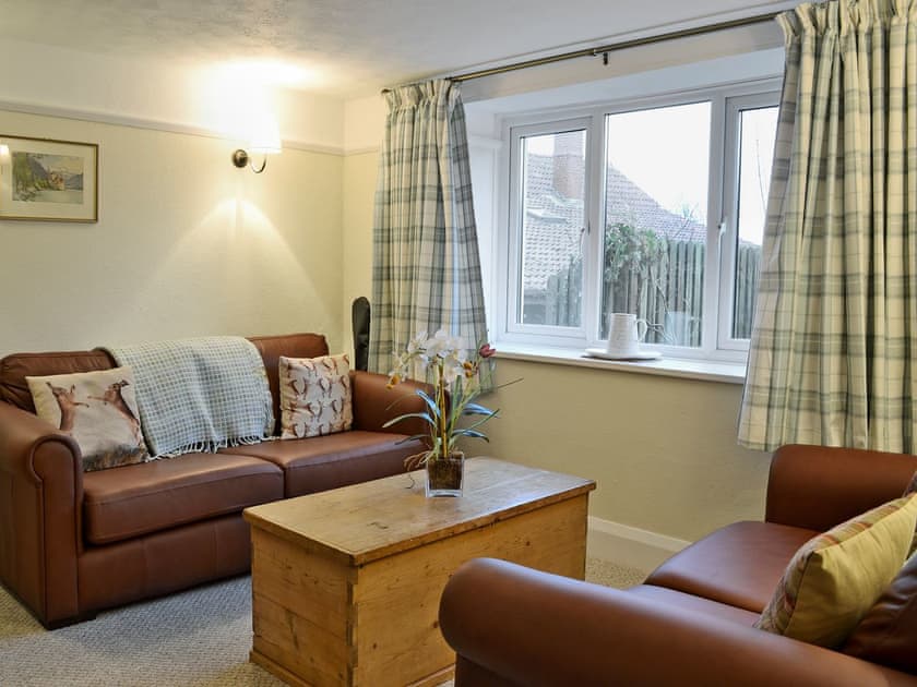 Tastefully furnished living room with wood burner | Penhill Farm Cottage, Fremington, near Barnstaple