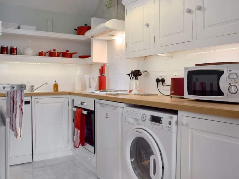 Well equipped kitchen | Coach Cottage - River Nene Cottages, Water Newton, near Peterborough