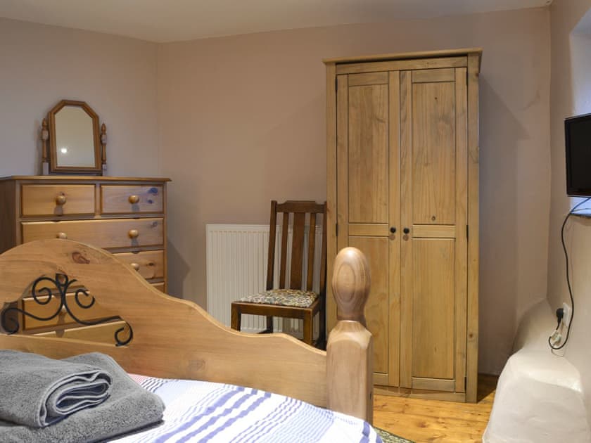 Ample storage and dressing area within double bedroom | The Stables - Tyddyn Iolyn, near Criccieth