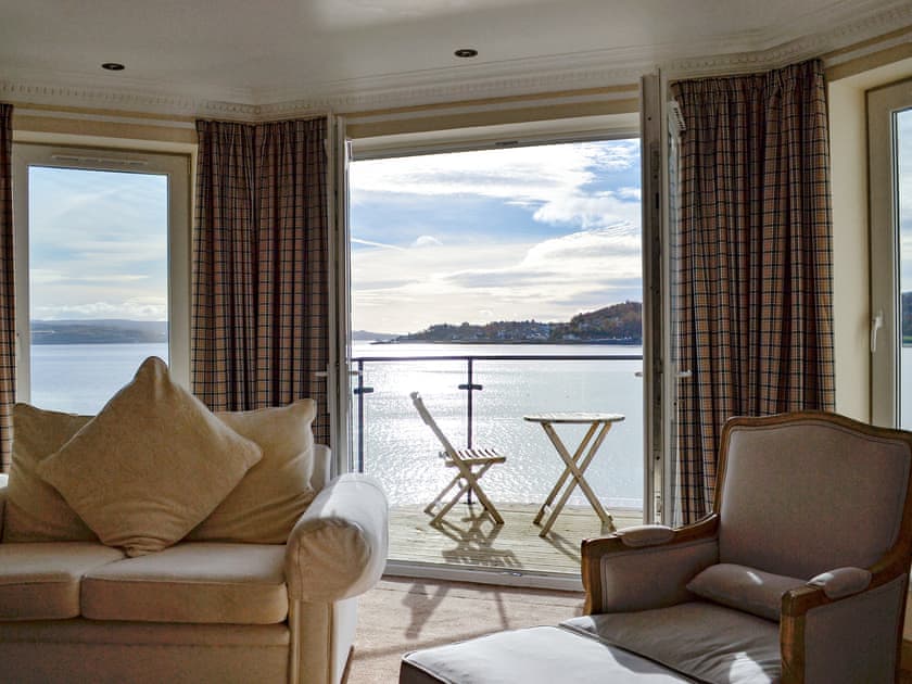 Living room with French doors opening onto balcony | The Penthouse, Strone, near Dunoon