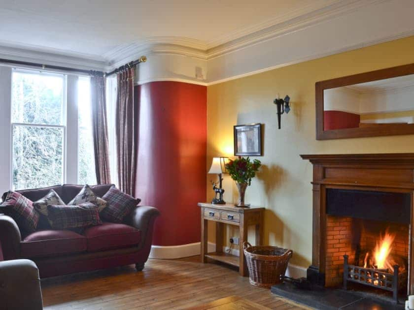 Large living room with open fire | Dallas Brae, Grantown-on-Spey