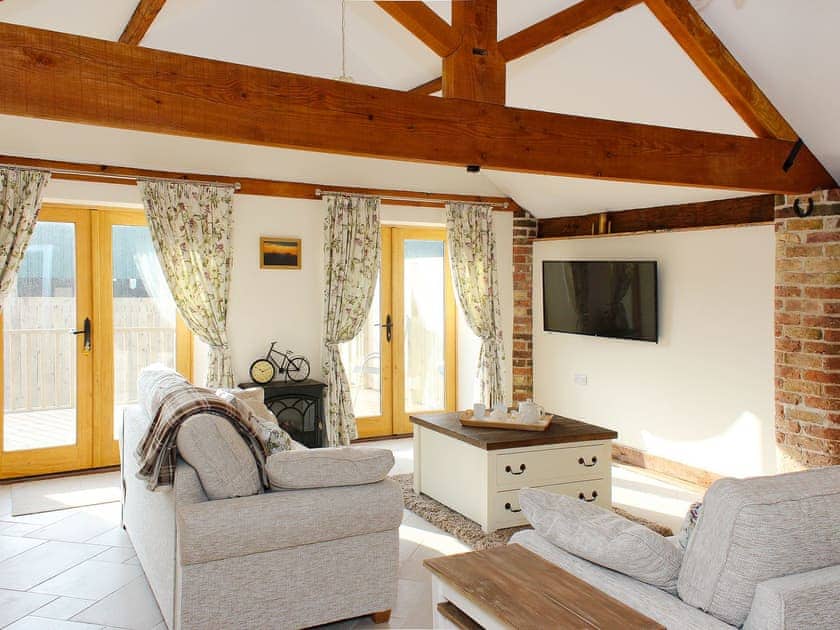 Charming light and airy living room with tiled floor | The Old Barn - Corporation Farm Cottages, Tickton, near Beverley