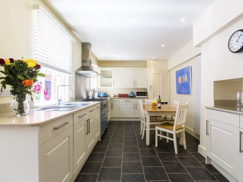 Well-equipped kitchen with informal dining area | Market Cross Place, Aldeburgh