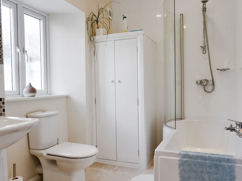 Bathroom with shower over bath | Catbells - Hillside Apartments, Keswick