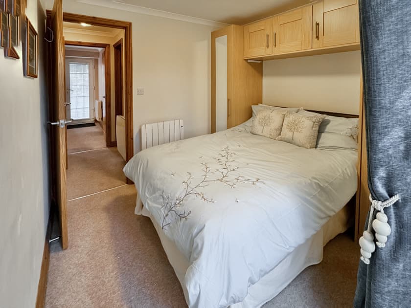 Double bed with built in storage | Greta Side Court Apartments no 2 - Greta Side Court Apartments, Keswick