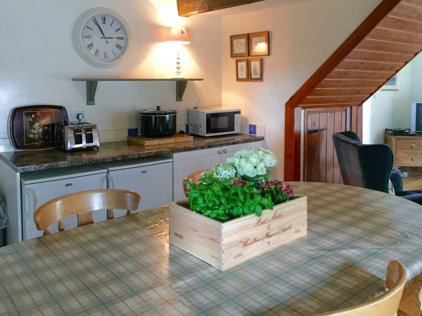 Dining and kitchen area of open plan room | Buttercup Down, Over Haddon, near Bakewell