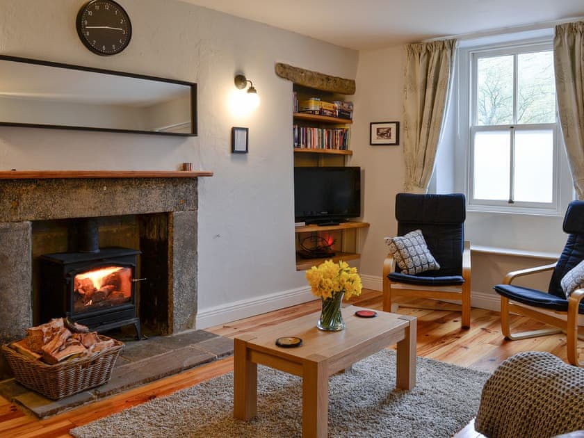 Living room with wood burning stove | Miller Cottage, Scalegill, near Kirkby Malham
