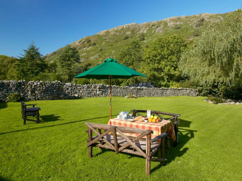 Large enclosed lawned garden | Hardknott Cottage - Bridge End Farm Cottages, Boot, near Eskdale