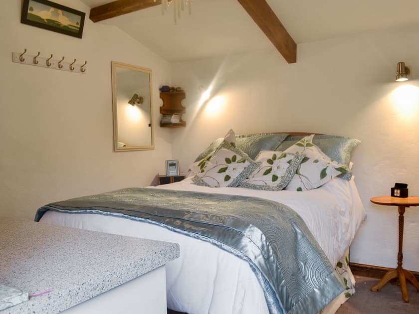 Separate building with double bed, kitchen area and en-suite wet room | The Old Goat House, Thornton Rust, near Leyburn