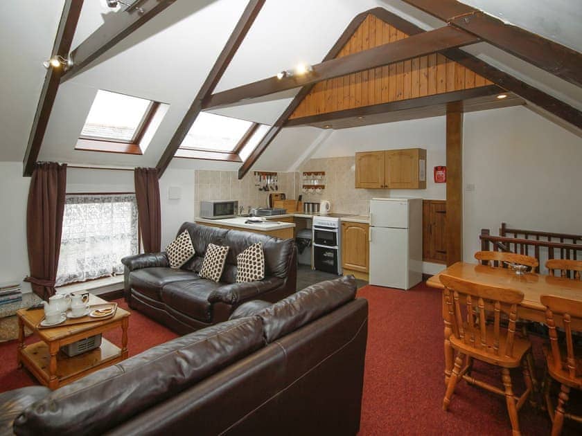 Open-plan design with exposed wooden beams | Tamarisk - East Rose, St Breward, near Bodmin