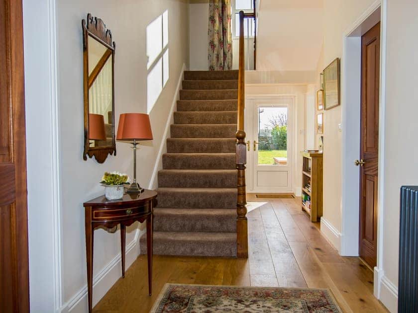 Large welcoming entrance hall with original 19th century staircase | The Laburnums, Askham, near Penrith