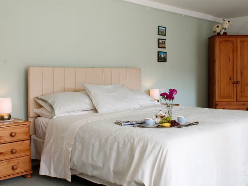 Double bed within family bedroom | Dairy Cottage, Barnstaple