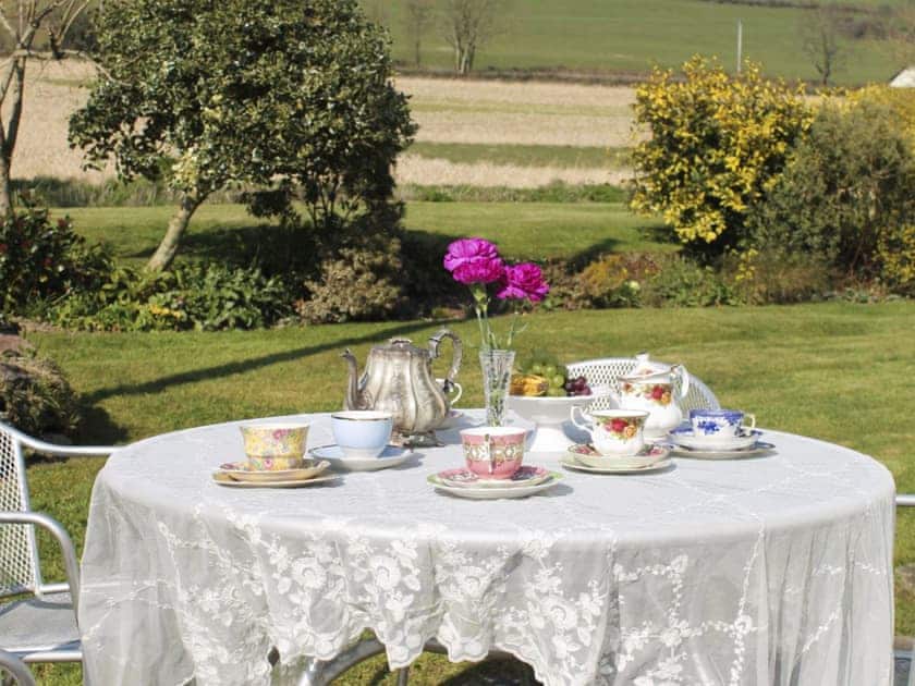Sitting out area within spacious garden at rear of property | Dairy Cottage, Barnstaple