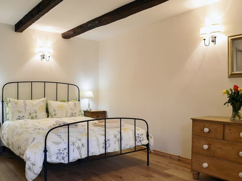 Spacious double bedroom with beamed cieling | No 6 Swallowholm Cottages, Arkengarthdale
