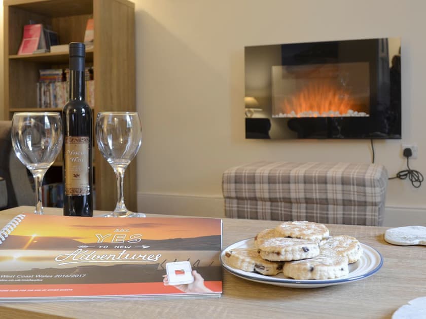 Stylish wall mounted fire in living room | Montrose, New Quay