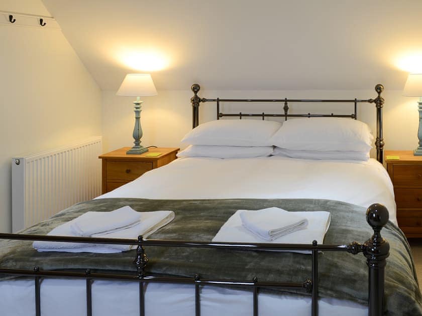 Romantic double bedroom with antique style kingsize bed | The Fish House - Rispond Estate, Rispond, near Durness