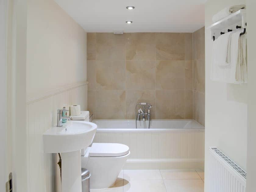House bathroom with shower over bath | The Fish House - Rispond Estate, Rispond, near Durness