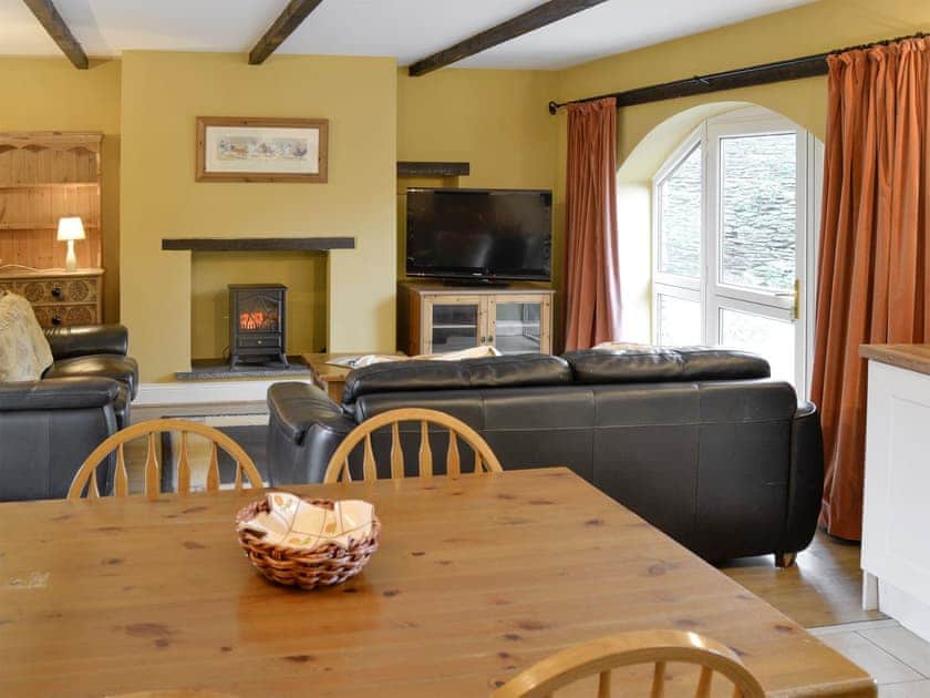 Convenient dining area within open-plan living space | Wheelwrights - Friars Cottages, Kentisbury Ford, near Barnstaple