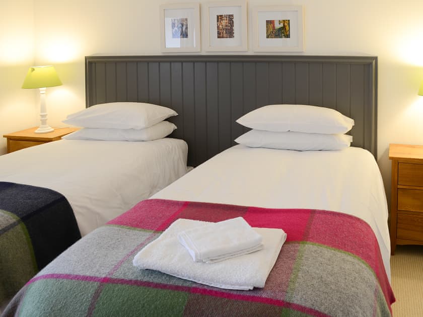 Bedroom with zip and link bed to make a super kingsize double or twin beds | The Byre - Rispond Estate, Rispond, near Durness
