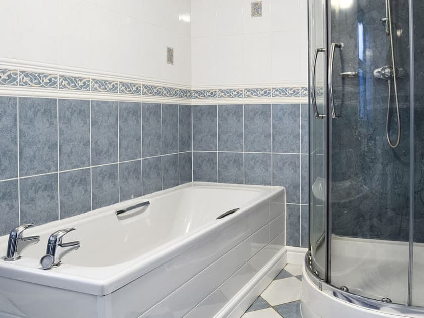 Well presented bathroom with separate shower cubicle | Ysgubor - Beudy Hen and Ysgubor, Llanfair, near Harlech