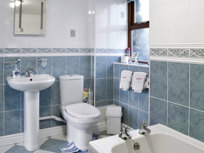Tiled bathroom | Ysgubor - Beudy Hen and Ysgubor, Llanfair, near Harlech