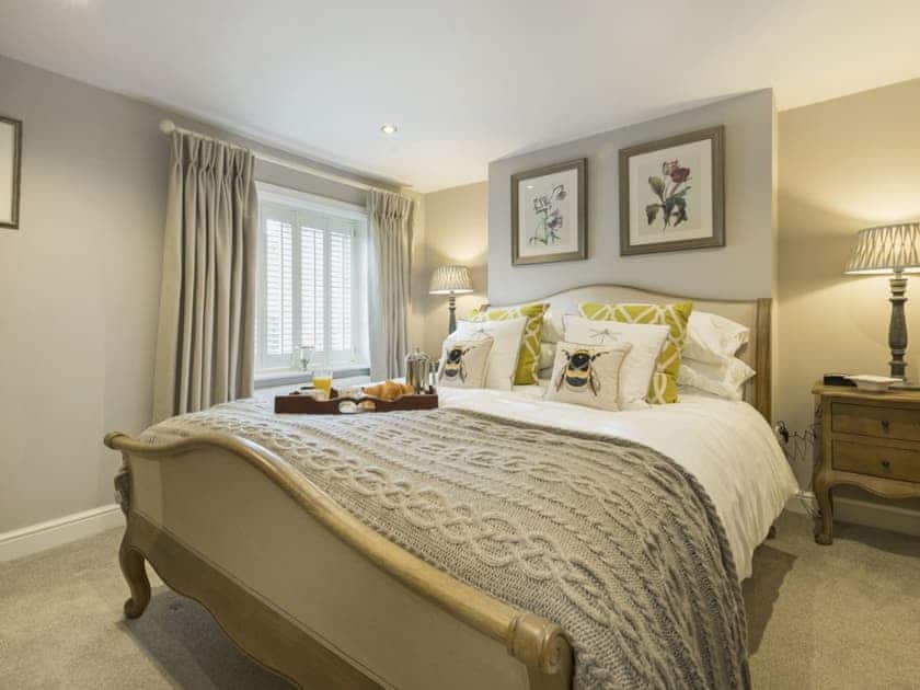Beautifully decorated double bedroom with kingsize bed | Pear Tree Cottage, Louth